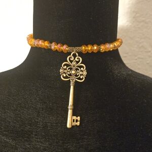 Gold Vintage Bag Pendent with Amber Beads